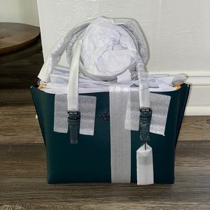 Brand new still packaged forest green coach mollie 25 tote bag